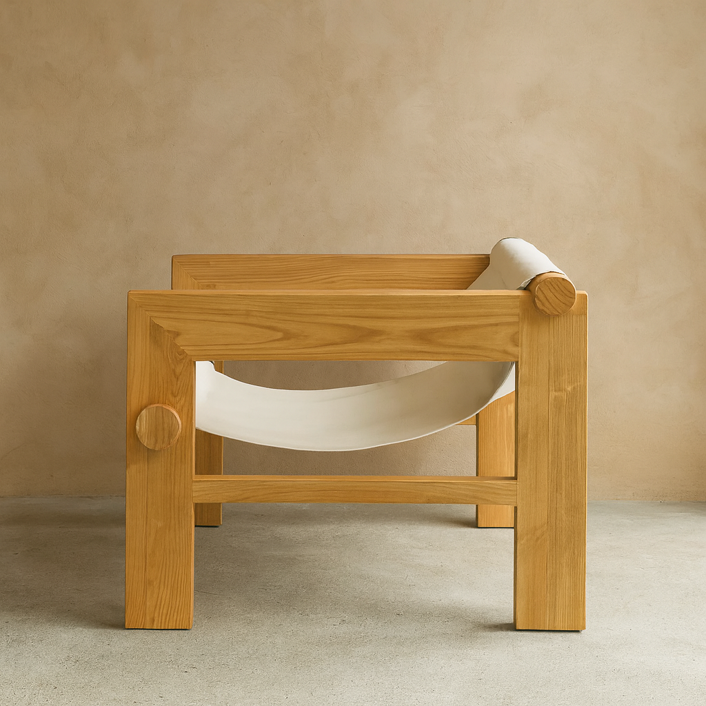 Brown sungkai wood armchair with white fabric sling seat.